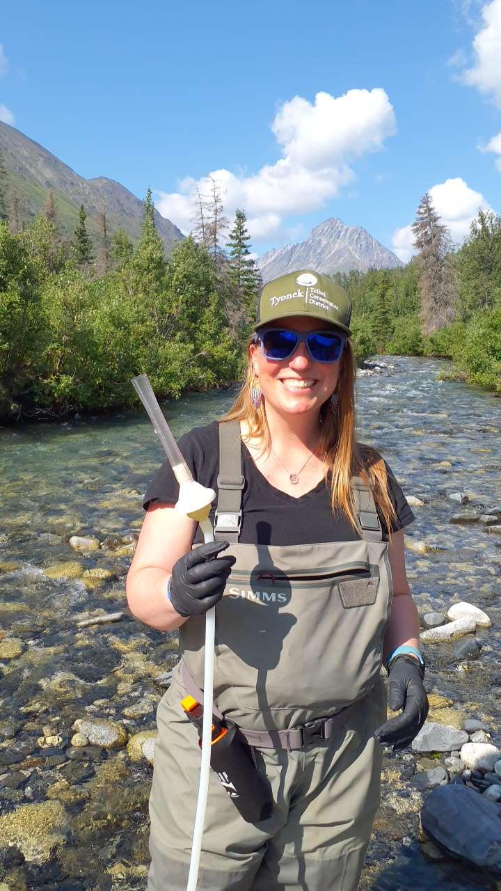 Habitat Programs Director conducting environmental DNA sampling